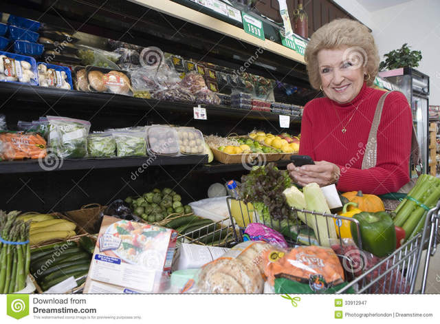 amateur mature porn sites mature free woman women doing portrait shopping smiling cellphone grocery supermarket