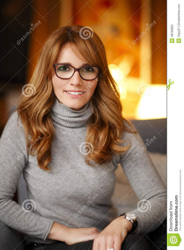 mature pics gallery mature woman photo gallery close sitting small business art sofa portrait stock owner shallow focus