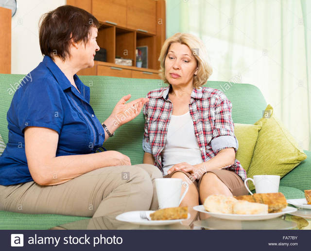 mature women pictures mature women photo home sad talking couch stock comp