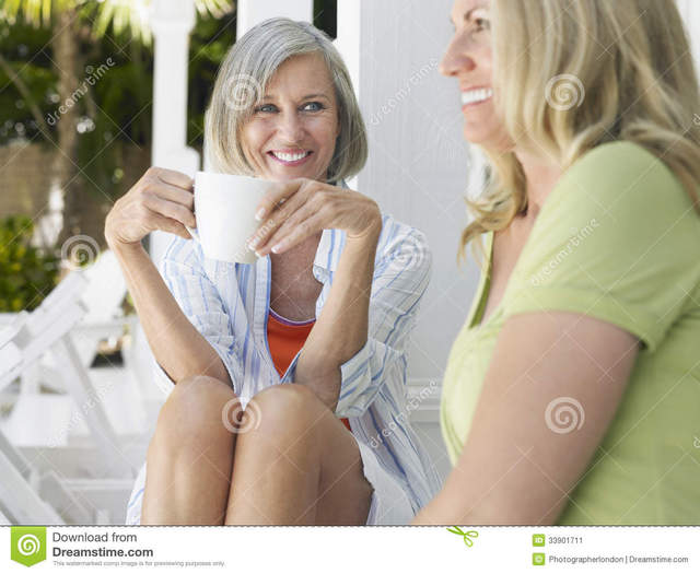 middle aged women porn pictures women young sitting cup happy vacation middle portrait stock aged coffee verandah