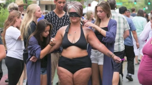 moms bikini pics mom videos bikini assets blindfold super dam market cnn cnnnext newday intv