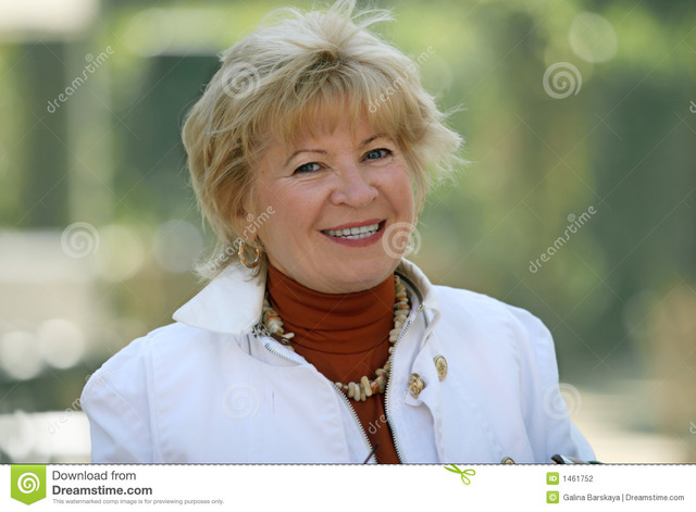 blond mature mature woman happy stock photography