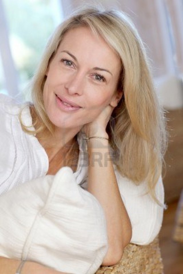 blond mature mature woman photo blond sofa portrait relaxing goodluz