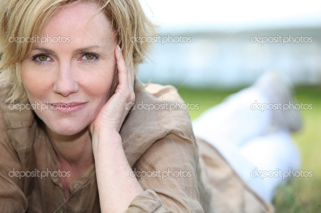 mature blonde mature blonde photo grass depositphotos lying portrait stock magnificent