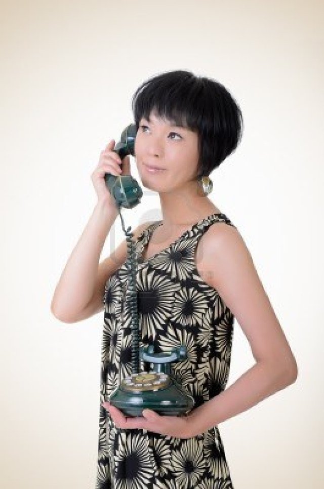 mature old mature woman old photo asian elegant background portrait closeup studio cellphone holding elwynn