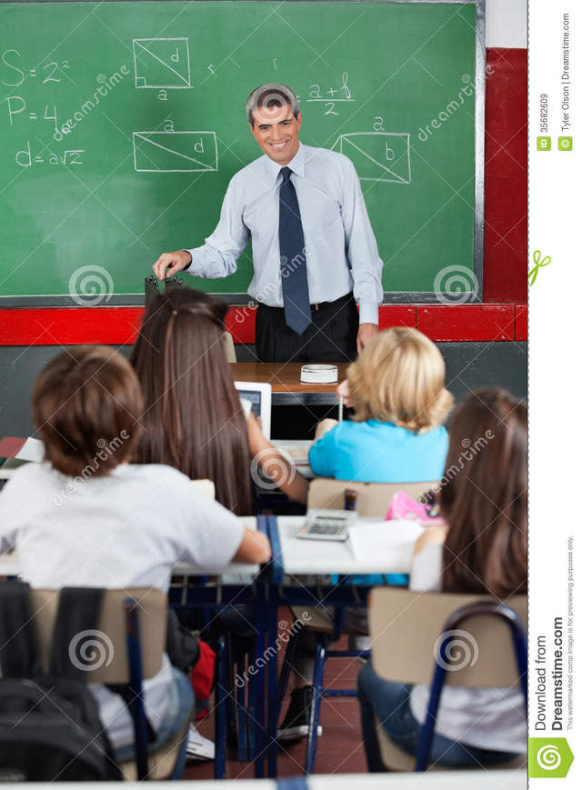 mature teacher mature male teacher looking happy students stock classroom