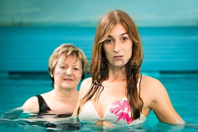 mature young mature woman young photo pool doing water swimming gymnastics also kzenon wellness concept