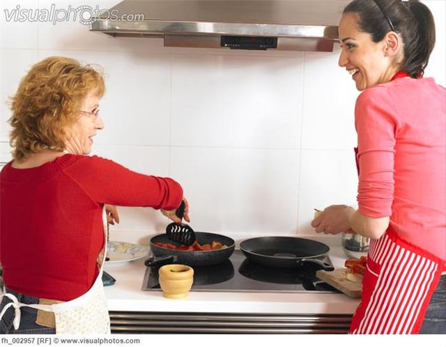mature young mature young mother photo daughter together rear cooking