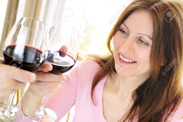 red mature mature woman photo red wine glass stock attractive elenathewise toasting