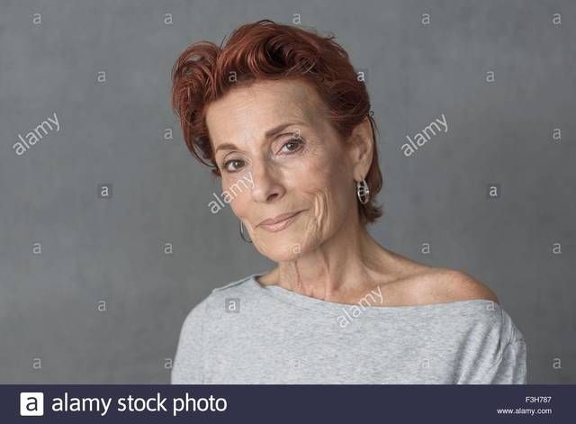 red mature short hair mature woman photo beautiful red portrait stock studio comp