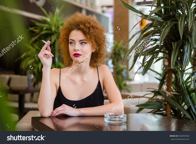 redhead mature hair woman photo pic redhead smoking curly stock restaurant thoughtful
