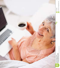 free older pic porn woman happy old woman drinking coffee using laptop royalty free stock