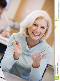 mature female porn mature female student gesturing class raising hand