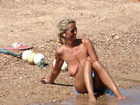 mature series porn voyeur porn topless blonde saggy beach mature photo