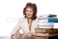 big pics mature preview mature woman sitting table books