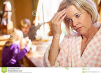 blonde mom pictures mom overwhelmed kids fight caucasian blonde foreground bathrobe holding head frustration background kitchen royalty free stock photography