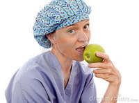 granny pics nurse medical person eating granny smith apple stock photography