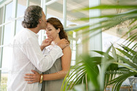 mature close up depositphotos close mature couple kissing home standing large glass doors stock photo