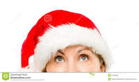mature close up close pretty mature woman wearing santa hat christmas looking stock photography