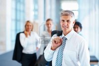 mature image logos happy mature business man his associates background photo