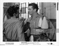 mature pictures gallery photos victor mature grasping shoulder man scene from film picture detail news photo