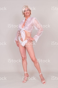 mature sexy photos sexy blond mature transsexual wearing seductive sheer picture photo