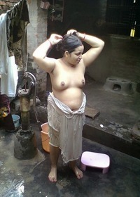 mature topless women indian woman bathing topless public mature