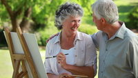 mature wife pic shutterstock videos video clip stock footage smiling mature man looking his wife who painting countryside