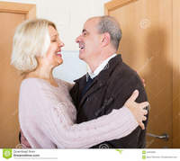 mature wife pic mature wife meeting husband near door happy senior women hugging elderly boyfriend doorway smiling stock photo