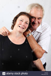 mature wife pic comp older mature married couple husband wife cuddling looking happy stock photo