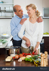 mature wife pix stock photo loving senior mature wife smiling preparing vegetables home kitchen pic