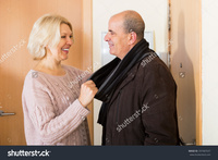 mature wife pix stock photo mature wife seeing husband off near door hall pic