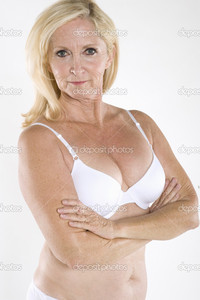 mature woman nude photos depositphotos portrait semi nude mature woman arms crossed stock photo
