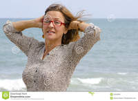 mature women pictures portrait mature woman stormy ocean weather stock photography