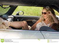 milf woman photo beautiful sexy woman sits car white dress sunglasses summer time milf open showing legs photos