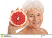 nude old women photos nude old woman holding grapefruit isolated white stock