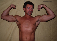 older nude pictures double biceps pose naked older wrestling guy gay nude