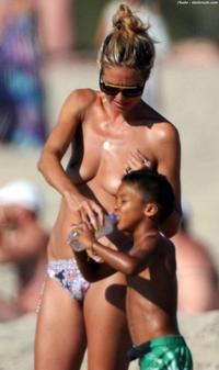 topless mom pics photos heidi klum topless beach mom hard work photo