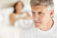 wife mature pic mature man thinking wife lying bed back stock photo