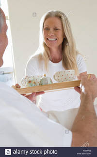 wife pics mature comp ahykxg mature man bringing wife breakfast bed carrying tray woman smiling stock photo