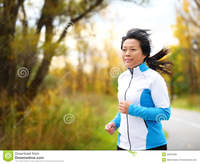 asian mature active woman running jogging middle aged asian mature female jogger outdoor living healthy lifestyle beautiful royalty free stock photos autumn city