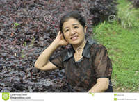 asian mature happy asian mature woman nature royalty free stock photo