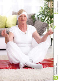 beautiful mature beautiful mature woman yoga lotus pose smiling senior exercise home royalty free stock photography