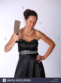 big mature comp mad mature woman knife meat cleaver stock photo