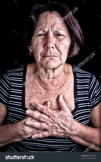 black mature stock photo mature woman suffering from chest pain depression black background pic