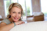 blond mature goodluz beautiful blond mature woman relaxing sofa photo