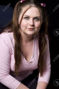 chubby mature yannp chubby girl pink shirt smiling stock photo overweight students