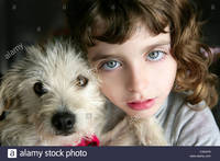 hairy bbw mature comp dog puppy girl hug portrait closeup blue eyes white hairy little stock photo