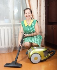 lady mature housework vacuum cleaner mature woman home photo