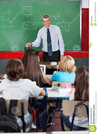 mature teacher teacher looking students classroom happy male mature stock